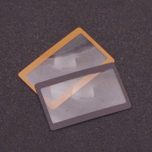 명함돋보기 검정 주황 홍보물품제작